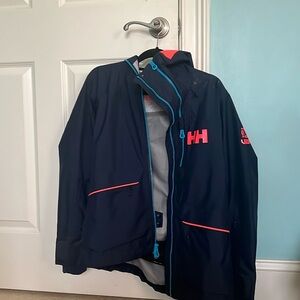 Helly Hansen rain jacket size small but fits a medium as well